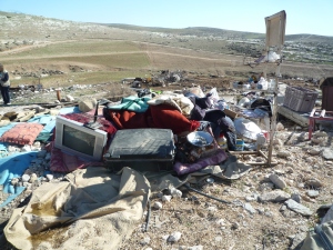 13.01.16 Khirbet Ar Rahwa belongings gathered before and after the demolition. Photo EAPPI